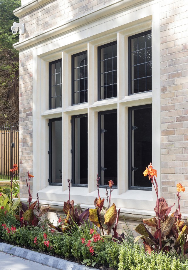 stone mullion windows bronze windows